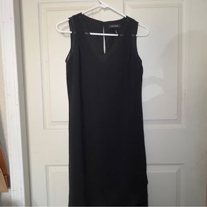 Sleeveless asymmetric black dress